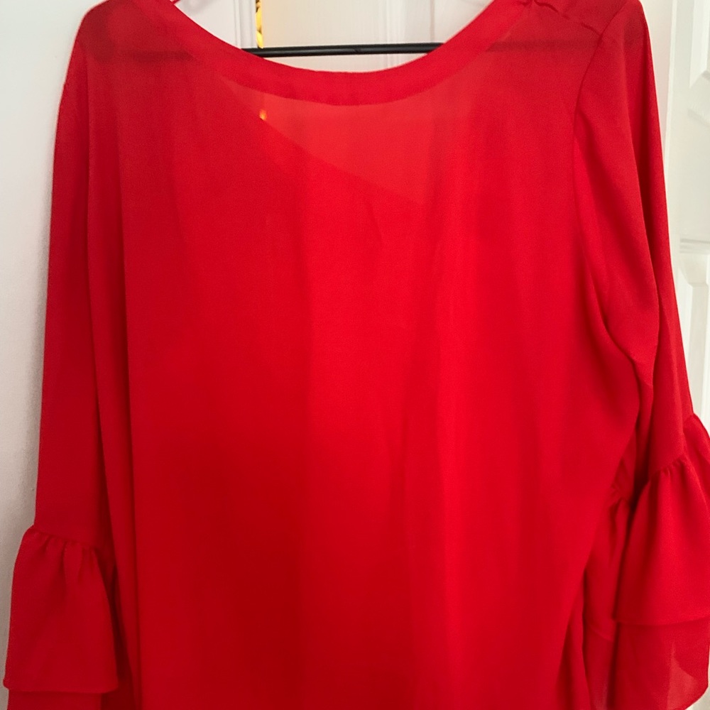 Red blouse with bell sleeves